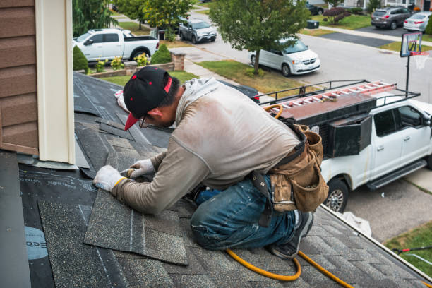 Professional Flat Roof Repair technician working in Corbett, OR